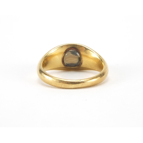 1028 - Unmarked gold cabochon garnet mourning ring, size I, approximate weight 5.3g