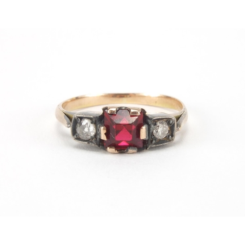 1007 - Unmarked gold red stone and diamond ring, size I, approximate weight 2.5g