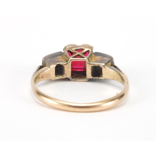 1007 - Unmarked gold red stone and diamond ring, size I, approximate weight 2.5g