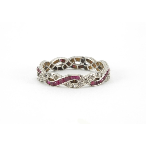 1047 - Unmarked white gold ruby and diamond entwined eternity ring, size J, approximate weight 2.5g