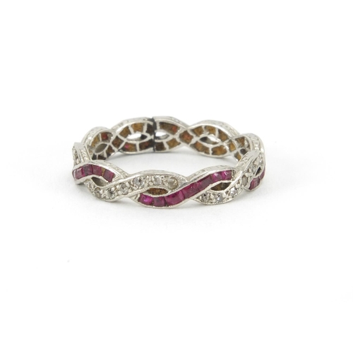 1047 - Unmarked white gold ruby and diamond entwined eternity ring, size J, approximate weight 2.5g