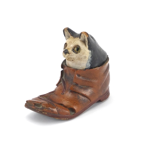 71 - Novelty treen cat in the shoe inkwell with beaded eyes, 12cm in length