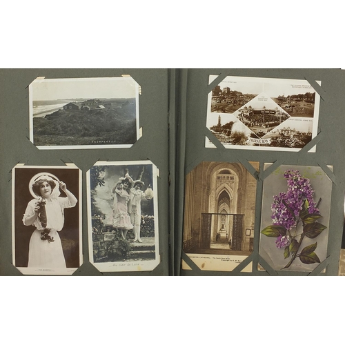 270 - Predominantly Military, topographical and greetings postcards arranged in an album, some black and w... 