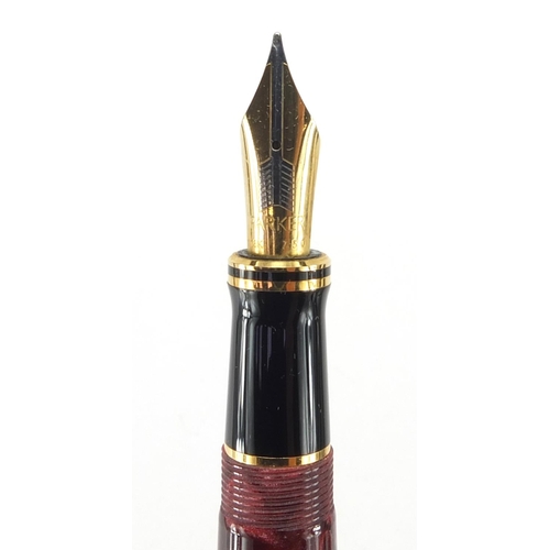 117 - Parker duofold centennial fountain pen in red marble with 18k gold nib and box