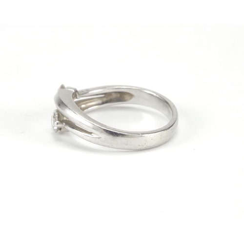 1005 - Platinum diamond crossover ring, size I, approximate weight 3.9