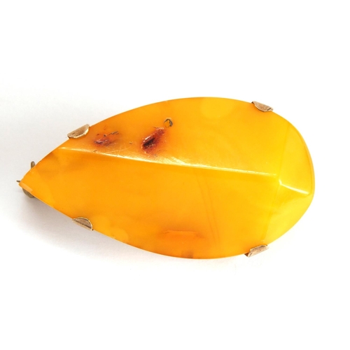 1053 - 9ct gold mounted Baltic amber brooch, 4.5cm in length, approximate weight 9.7g