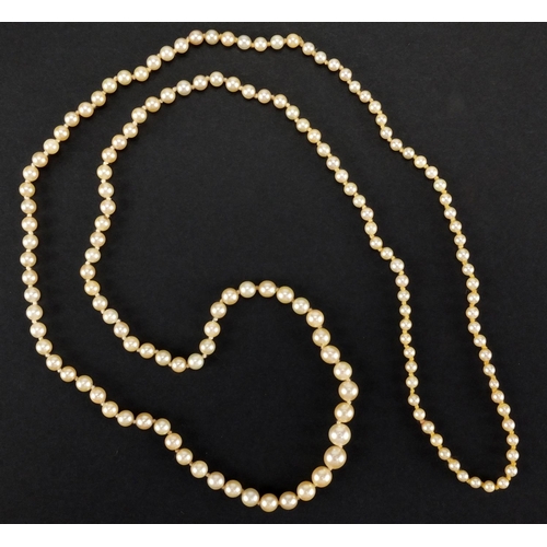 1052 - Single string pearl necklace, 84cm in length, approximate weight 22.5g