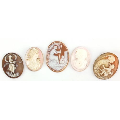 1031 - Four Victorian and later carved cameo panels, the largest 5cm in length