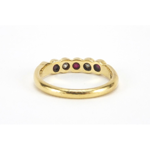 1041 - 18ct gold ruby and diamond half eternity ring set with three rubyies and two diamonds, size N, appro... 