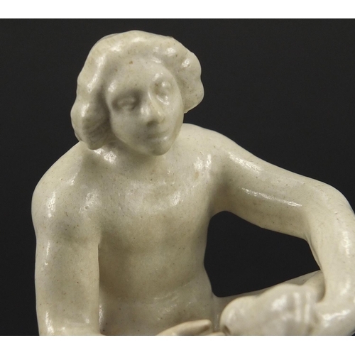 682 - 18th century Staffordshire salt glazed stoneware Greco- Roman figure of a boy, 11cm in length