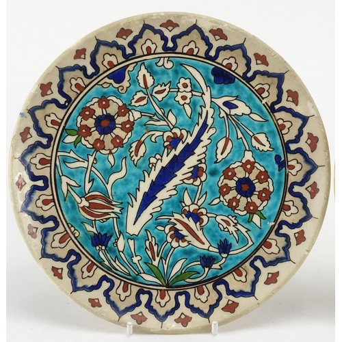 642 - Pair of Kutahya pottery plates both hand painted with stylised flowers, impressed marks to the rever... 