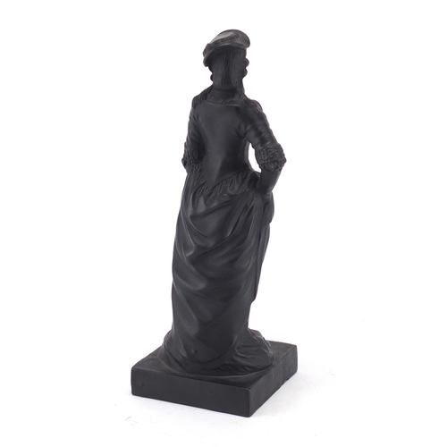 684 - Early 19th century English basalt figure of a lady in traditional dress, 21.5cm high