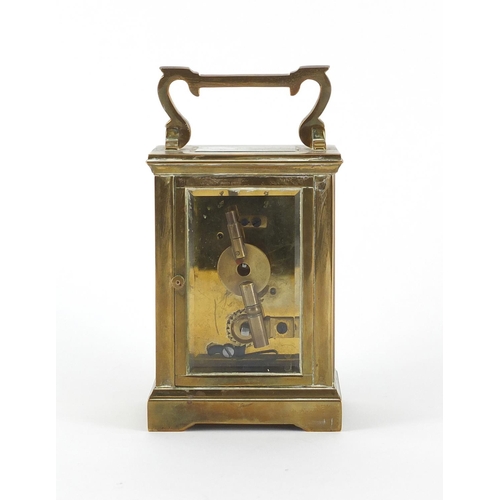 1134 - Brass cased carriage clock by Dent of Pall Mall London, with bevelled glass enamelled dial and Roman... 