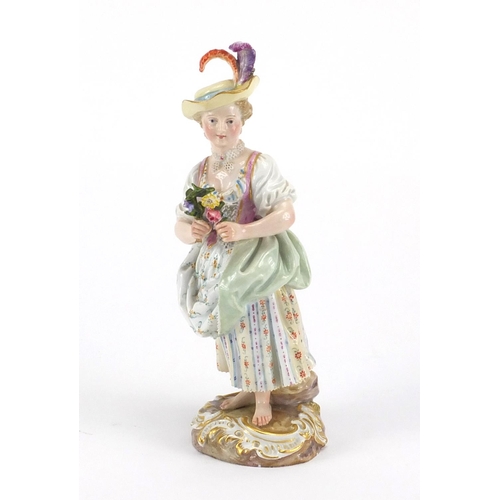 717 - 19th century Meissen porcelain figure of a girl holding flowers, blue under glazed crossword marks t... 