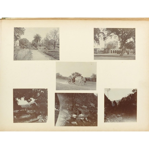 249 - Black and white photographs arranged in an album of subjects in India including various buildings in... 