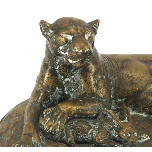 24 - Paul-Edouard Delabrierre 1829-1912, patinated bronze recumbent Puma with a Fennec fox on oval base, ... 