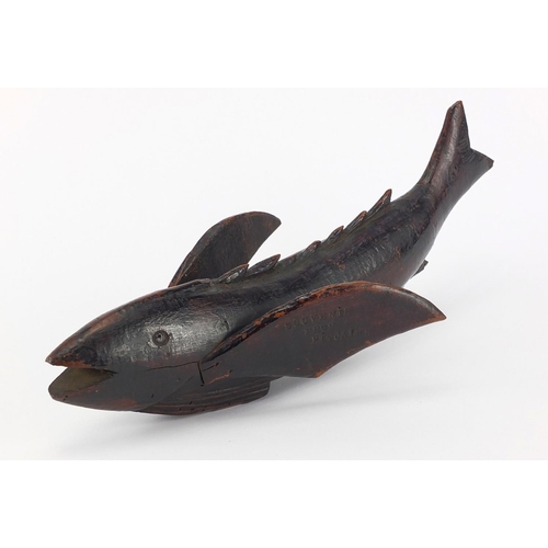 51 - Pitcairn carved wooden flying fish, stamped souvenir form Pitcairn to both wings, 33.5cm in length