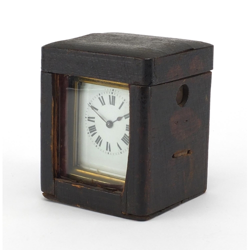 1133 - French brass cased carriage clock with travelling case, the clock with enamelled dial and bevelled g... 