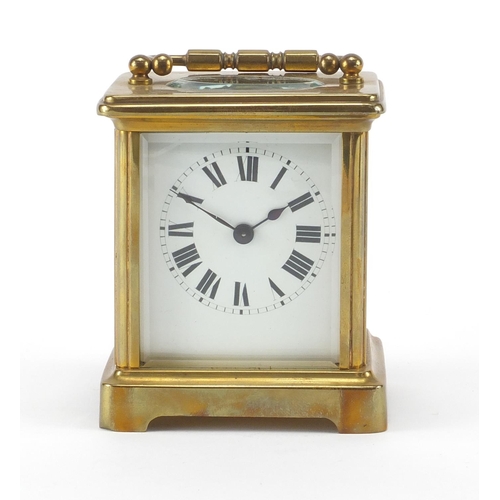 1133 - French brass cased carriage clock with travelling case, the clock with enamelled dial and bevelled g... 