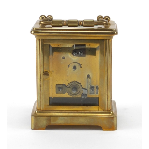 1133 - French brass cased carriage clock with travelling case, the clock with enamelled dial and bevelled g... 