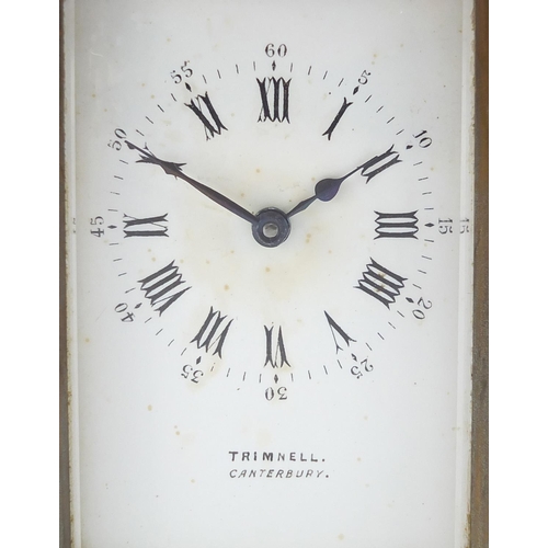 1131 - Victorian brass cased carriage clock, the enamel dial with roman numerals and seconds for Trimnell, ... 