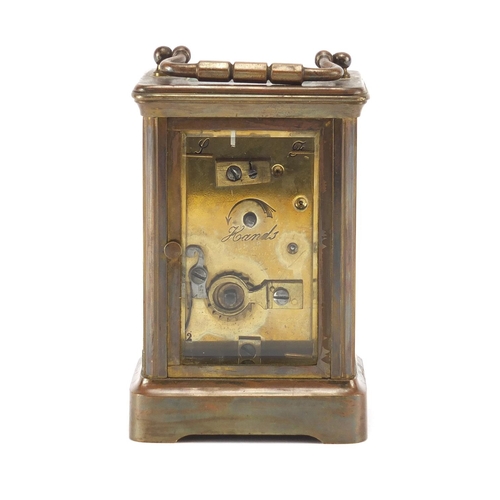 1131 - Victorian brass cased carriage clock, the enamel dial with roman numerals and seconds for Trimnell, ... 