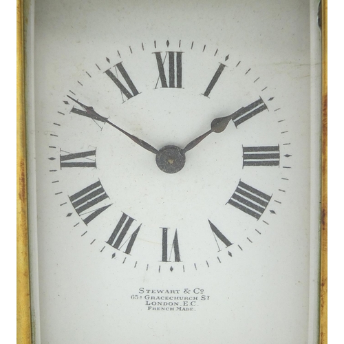 1132 - Victorian serpentine fronted brass carriage clock, the enamel dial with roman numerals for Stewart &... 