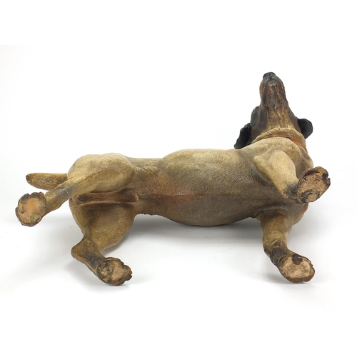 711 - 19th century life size terracotta terrier dog with beaded eyes, 57cm in length