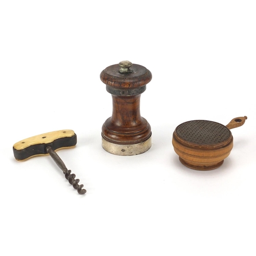 80 - Silver banded oak pepper mill, treen nutmeg grater and a bone handled corkscrew