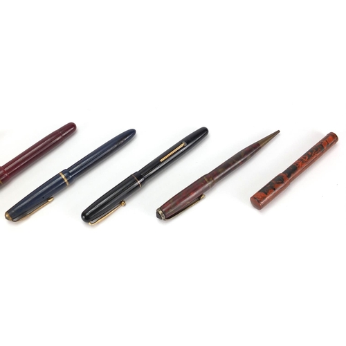 109 - Fountain pens and propelling pencils including a brown ripple case, Swan self-filler, 12ct rolled go... 