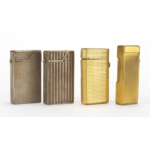 102 - Four Dunhill pocket lighters comprising two silver plated and two gold plated, various numbers to th... 