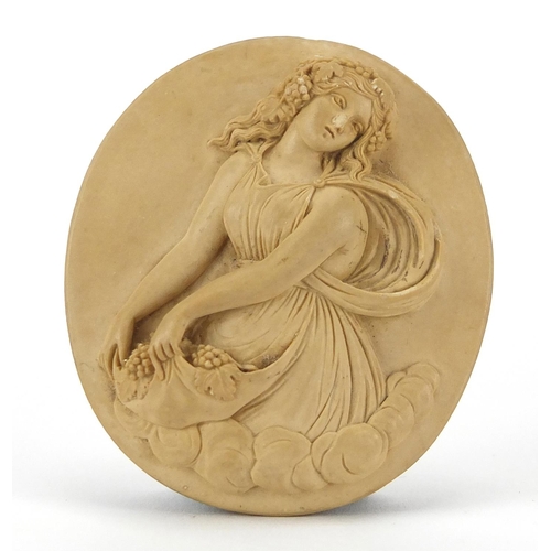 1042 - Oval lava cameo of a maiden holding grapes, 5.3cm x 4.6cm