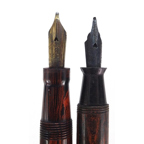 106 - Swan brown ripple fountain pen with gilt bands and 14ct gold nib, together with a similar example