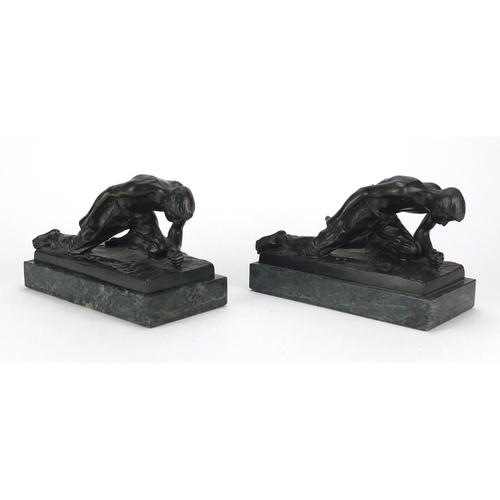 27 - J Valenta, pair of early 20th century Austrian patinated bronze figural bookends, both mounted on a ... 