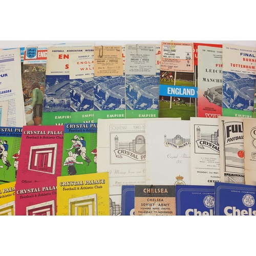 228 - 1950's and later football programmes some with tickets including Chelsea v Soviet Army 1957, Arsenal... 