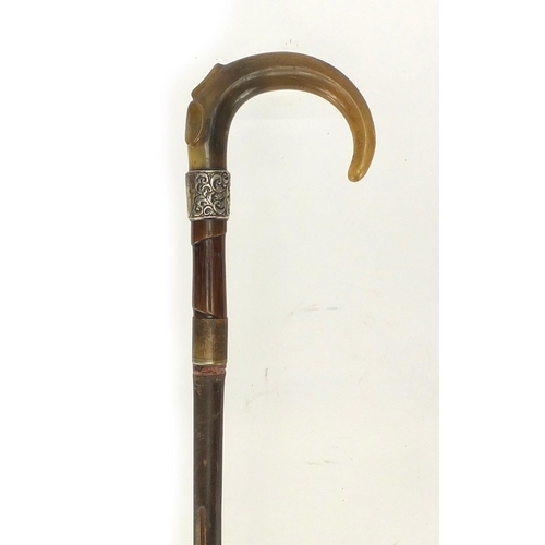 130 - Horn handled walking stick with silver collar and brass ferrule, possibly rhino horn, 91cm in length