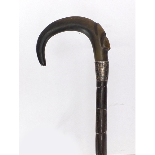 129 - Horn handed bamboo walking stick with silver collar, possibly rhino horn, 87cm in length