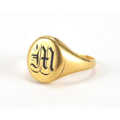 1017 - 18ct gold enamelled signet ring with hinged front, size P, approximate weight 8.7g