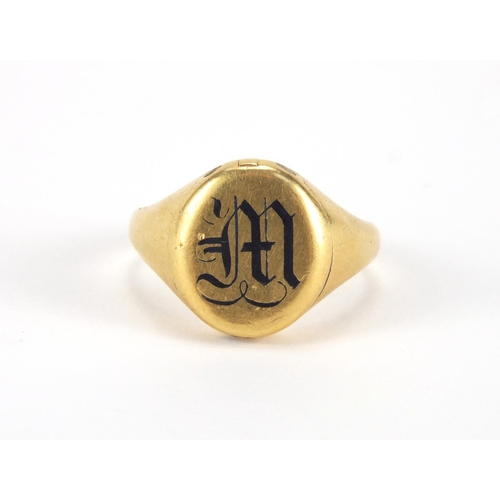 1017 - 18ct gold enamelled signet ring with hinged front, size P, approximate weight 8.7g