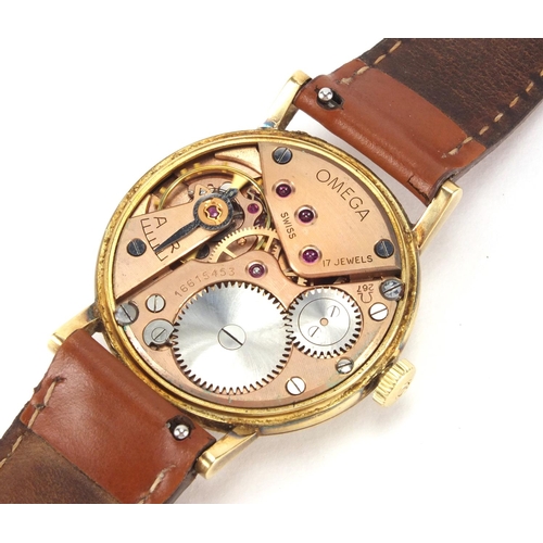 1067 - 14ct gold Omega gentleman's wristwatch numbered 16615453 to the movement, 3cm I diameter excluding t... 