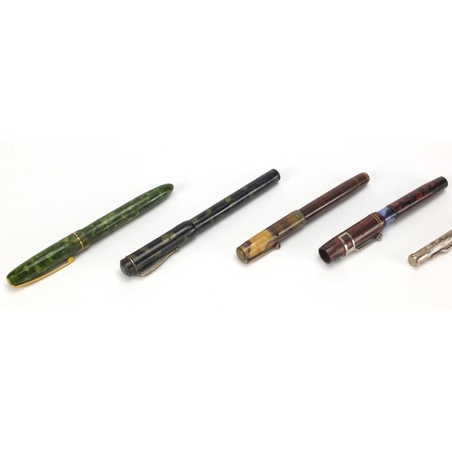 111 - Fountain pens and propelling pencils including two silver yard-o-led, green marbleised blackbird wit... 