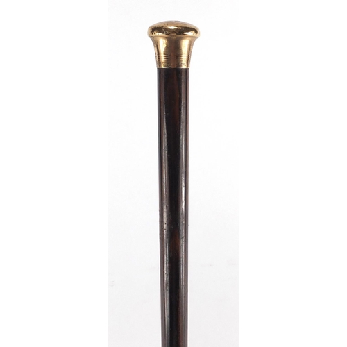 121 - 9ct gold mounted exotic wood walking cane by Kendall, with brass ferrule, 92cm in length