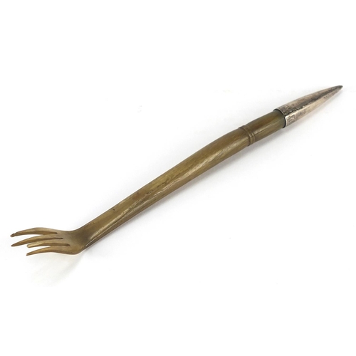 79 - Horn back scratcher in the form of a hand, possibly rhino horn, 27cm in length