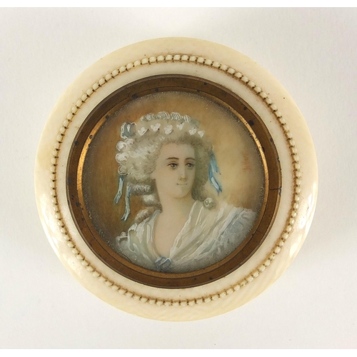 9 - Circular ivory box and cover, the lid with a hand painted portrait miniature of a female, 6cm in dia... 