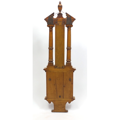 1145 - Oak aneroid barometer thermometer, with broken arch pediment and urn finial, 95cm in length