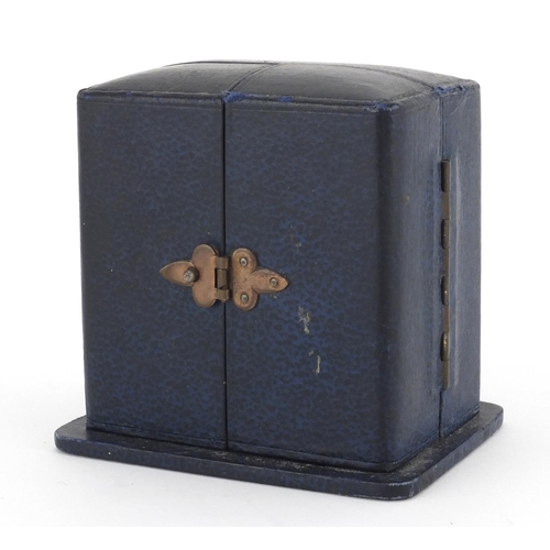 1135 - Art Deco brass travel alarm clock retailed by Reid  & Sons, with fitted case, 5.8cm high