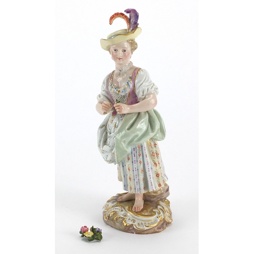 717 - 19th century Meissen porcelain figure of a girl holding flowers, blue under glazed crossword marks t... 