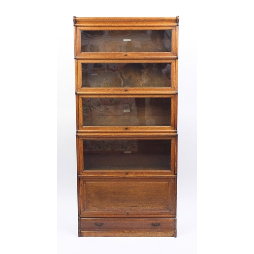 2003 - Globe-Wernicke five section bookcase with a base drawer, 190cm H x 86cm W