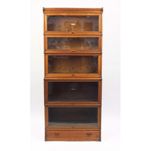 2001 - Globe-Wernicke five section glazed bookcase with a base drawer, 200cm high x 86cm wide