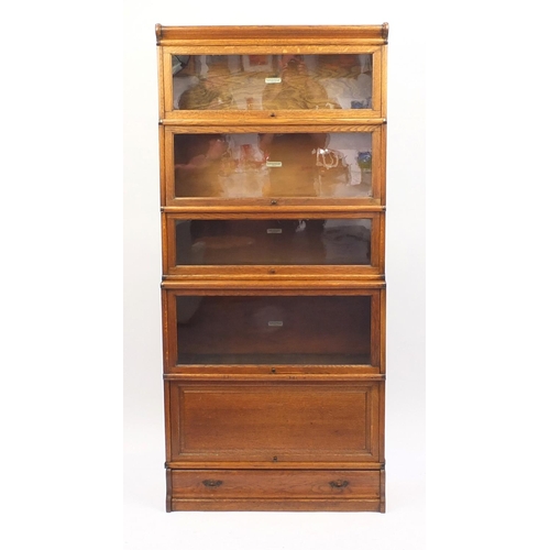 2002 - Globe-Wernicke five section bookcase with a base drawer, 190cm H x 86cm W